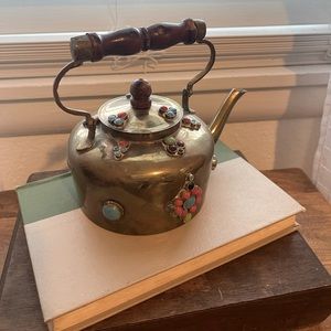 Brass tea pot with stones